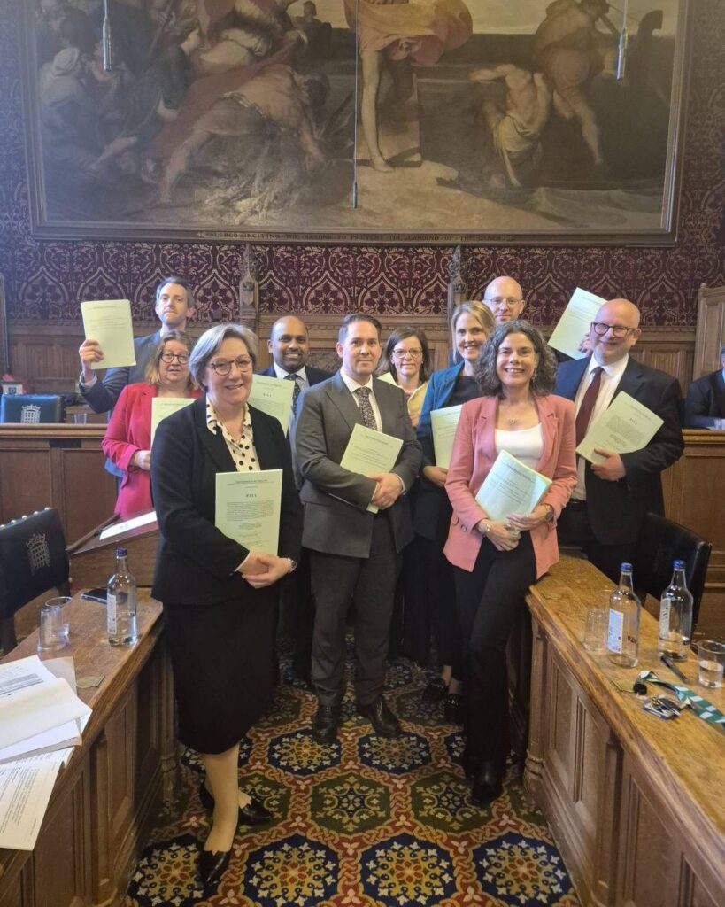 Samantha Dixon MBE MP with fellow MPs following passage of a Bill